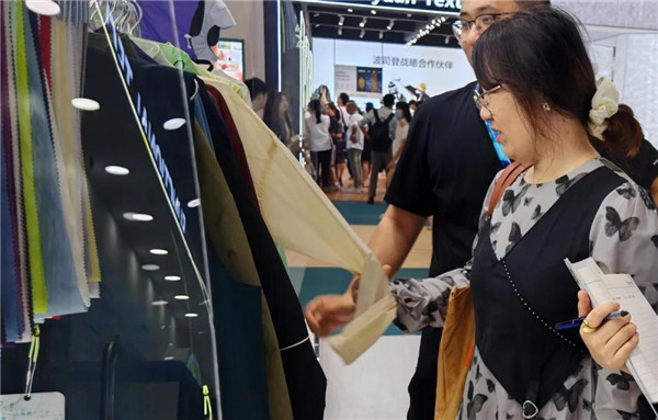 九游娱乐：功能绿色唱“主角”国风中式添“新意”长丝织物新品迭出(图1)