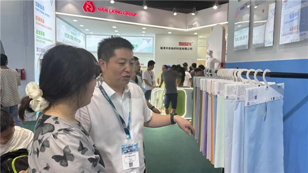 九游娱乐：功能绿色唱“主角”国风中式添“新意”长丝织物新品迭出(图5)