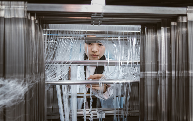 九游娱乐：之江封面⑯｜绍兴柯桥：看传统纺织业如何“破圈”(图3)